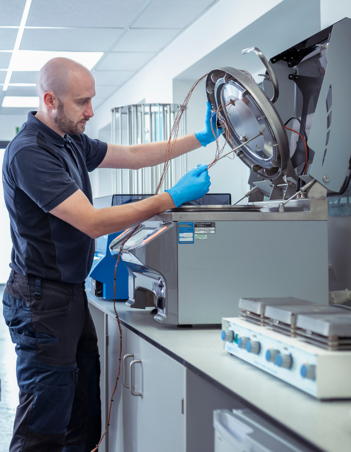 DWS Service Engineer, Adam Murray, servicing equipment.