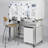 Cupboard on a trolley with a Whitley Workstation